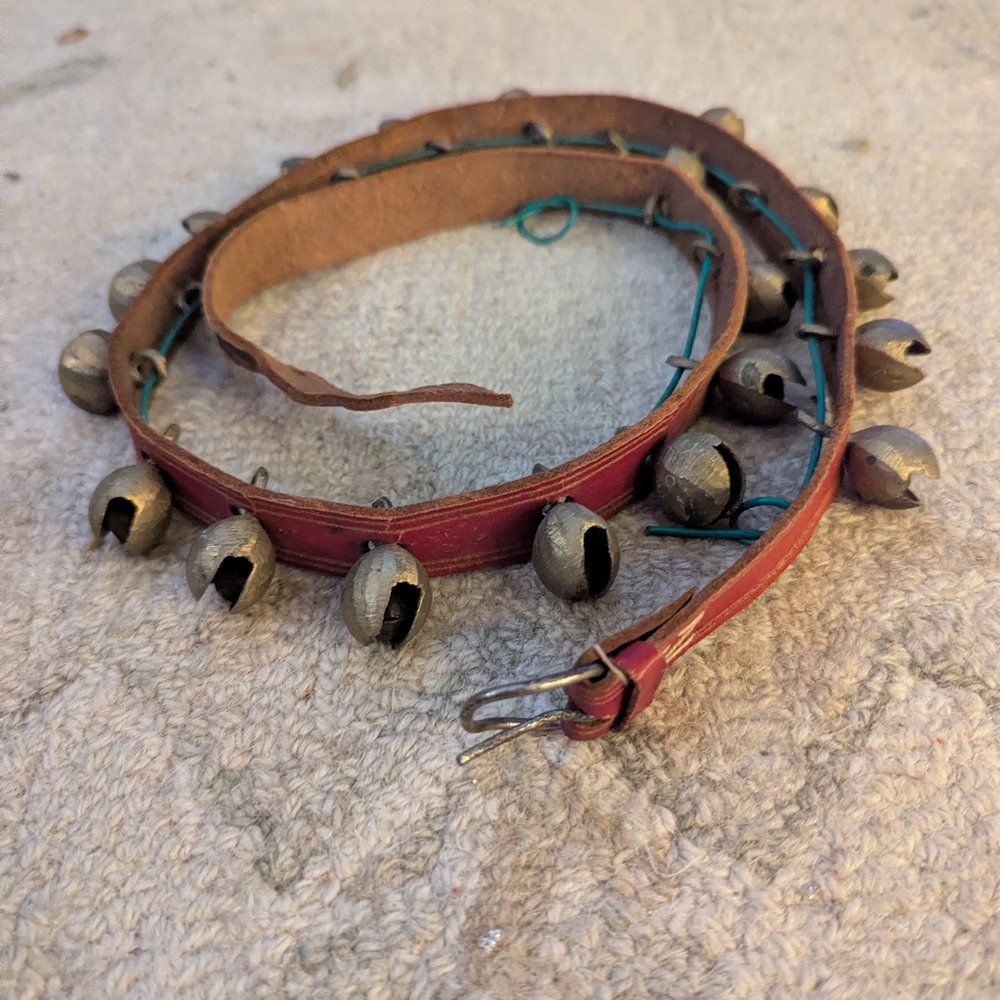 antique sleigh bells 20 brass bells on red leather